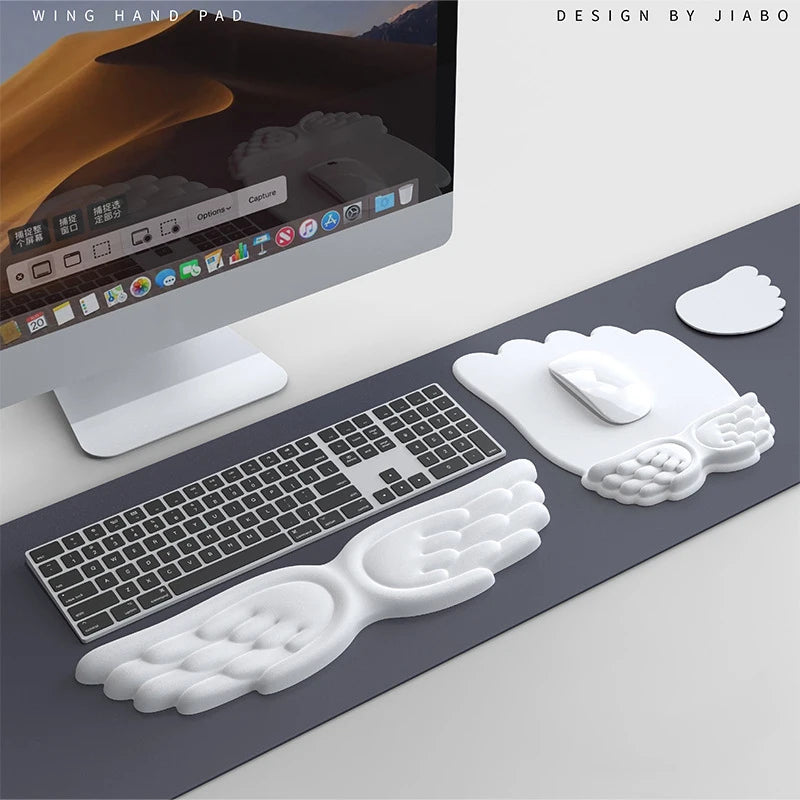 Alfombrilla ergonómica para teclado con alas de ángel