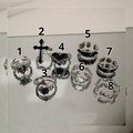Set de 8 anillos asimétricos de corazón y cruz plateada