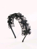 Diadema negra con lazos y encaje