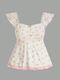Blusa color pastel con detalles flores y encaje rosa