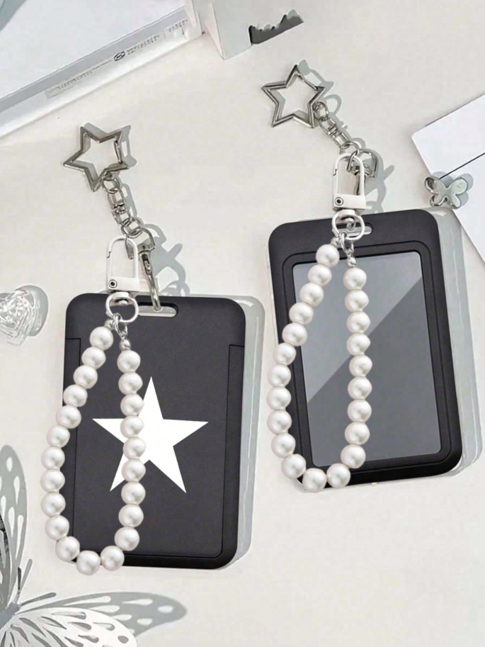 Portacarnet negro con estrella blanca  y colgante de perla