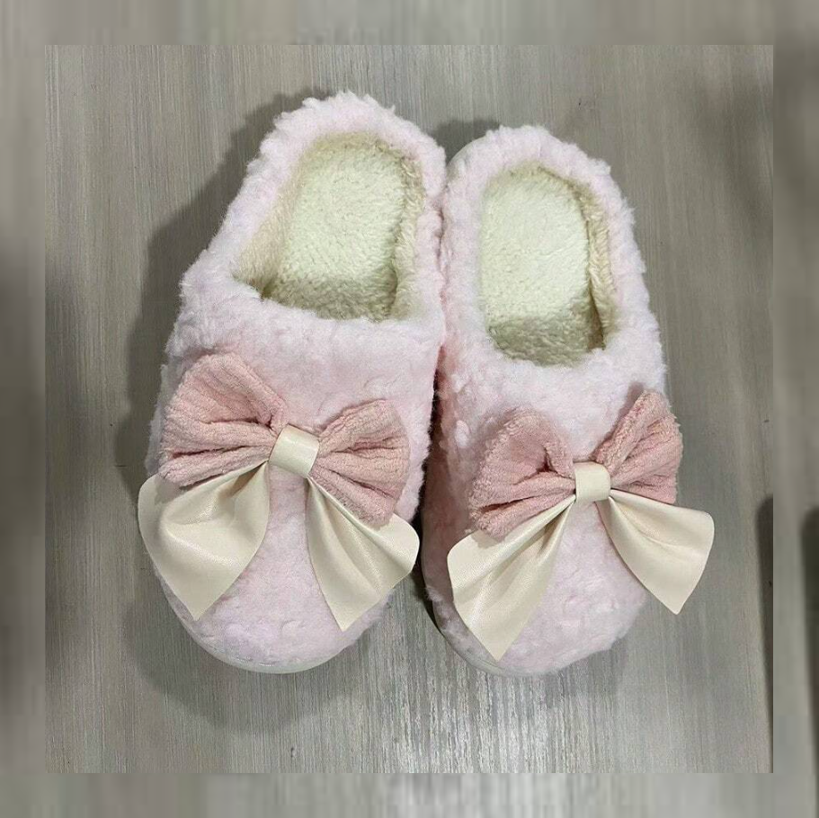 Pantuflas rosas con lazo