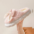 Pantuflas rosas con lazo