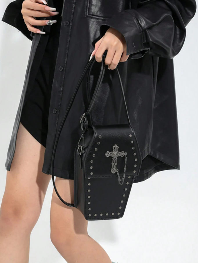 Bolso de ataúd y cruz