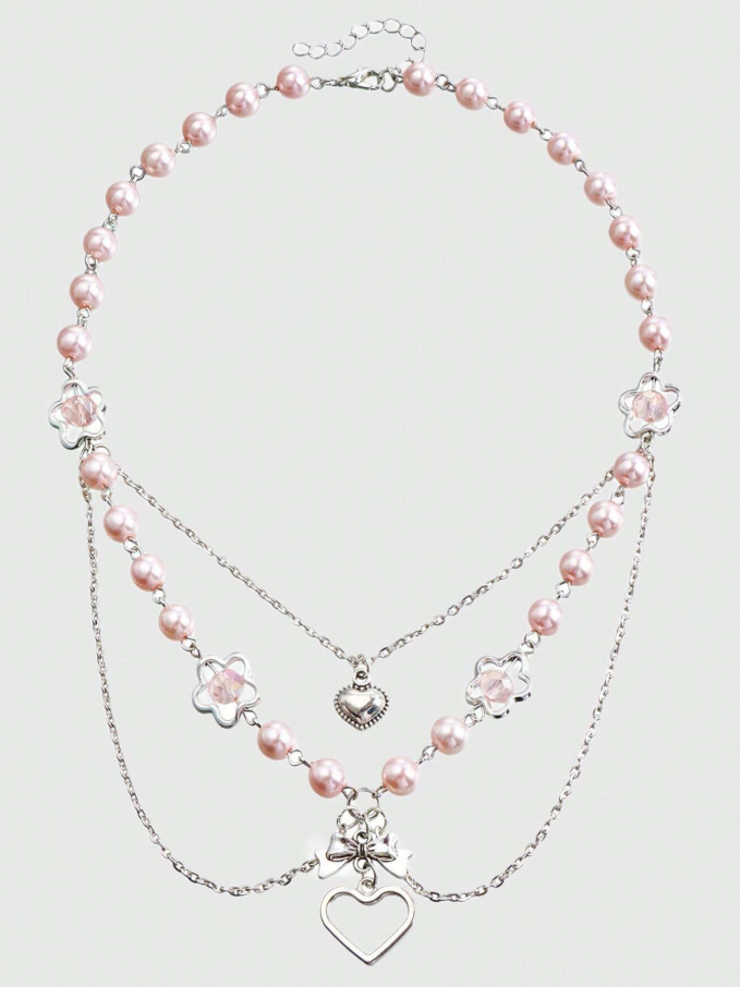 Collar multicapas con dijes de corazón y flor