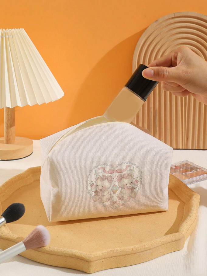 Cosmetiquera de terciopelo rosa con patrón de ositos