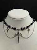 Colgante perlas negras y estrellas