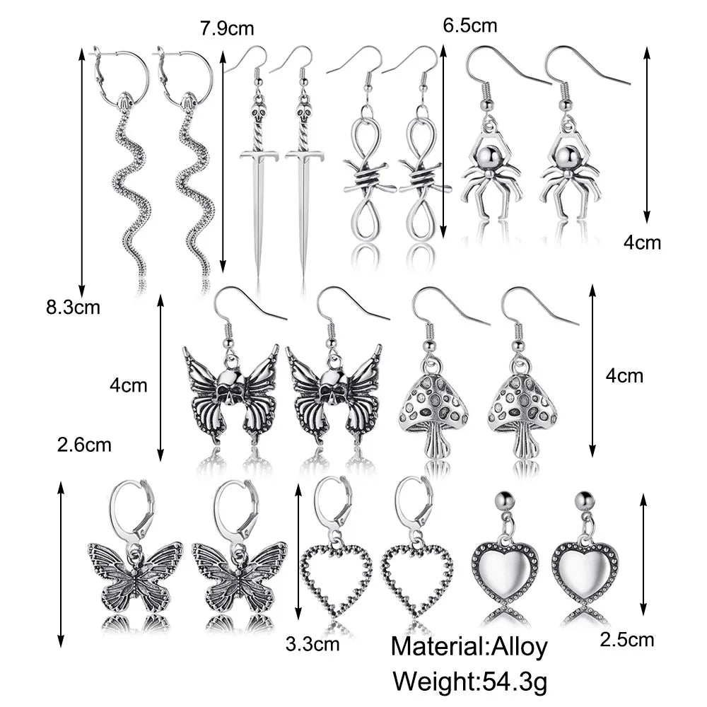 Pares de aretes goticos plateados