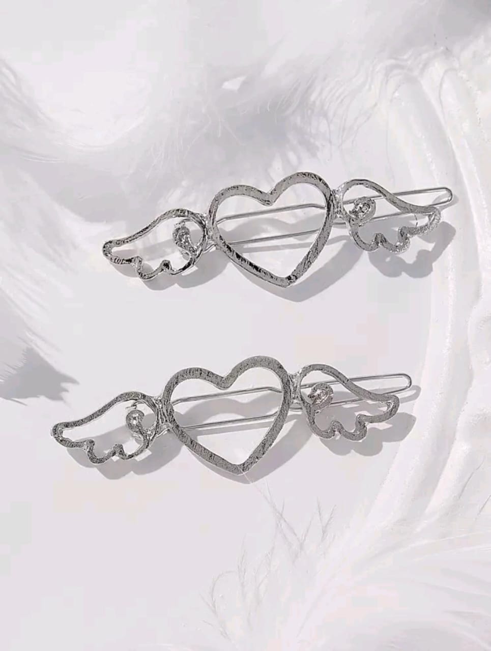 Set de 2 clips para el cabello con forma de corazon y alas de angel